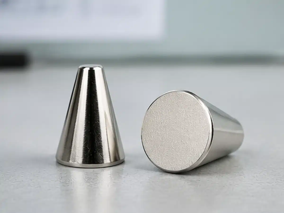 Side profile of a neodymium cone magnet showing the tapered body, flat tip and broad base